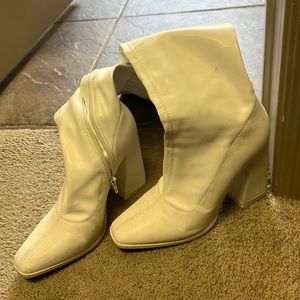 Women’s knee high white boots